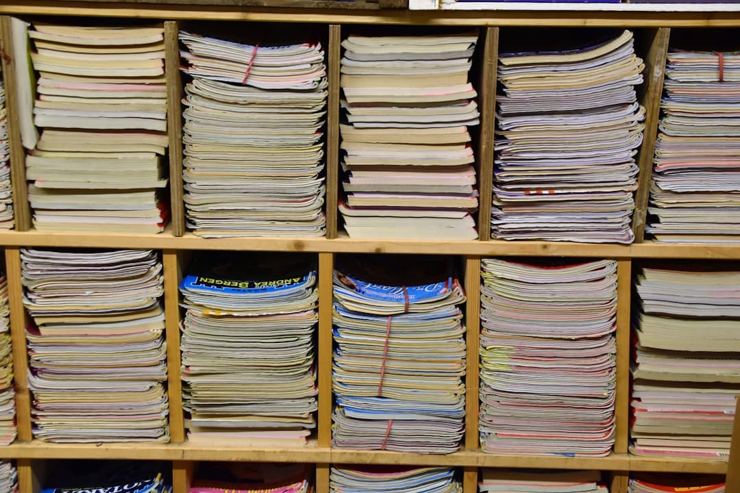 Organised business documentation and data files on a desk